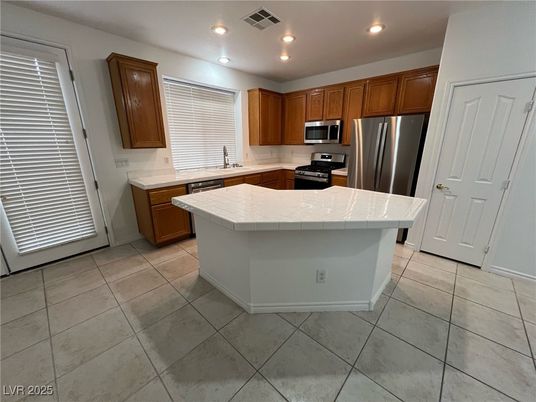 Interior, Kitchen, Recessed Lighting, Stainless Steel Appliances, Tile Countertops