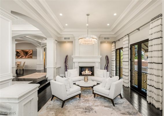 Chandelier, Fireplace, Interior, Living room, Recessed Lighting, Wood Texture Flooring