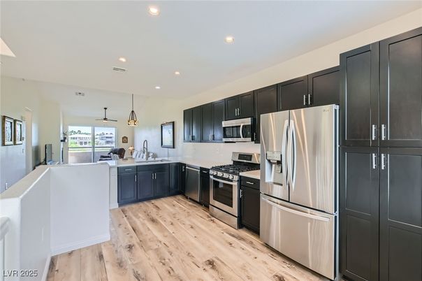 Interior, Kitchen, Pendant Lights, Recessed Lighting, Stainless Steel Appliances, Wood Texture Flooring