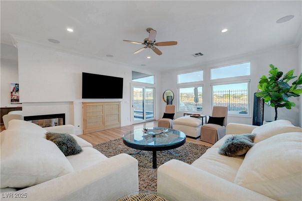 Dining room, Fireplace, Interior, Living room, Recessed Lighting, Wood Texture Flooring