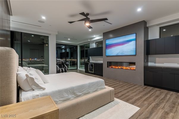Bedroom, Fireplace, Interior, Recessed Lighting, Wood Texture Flooring