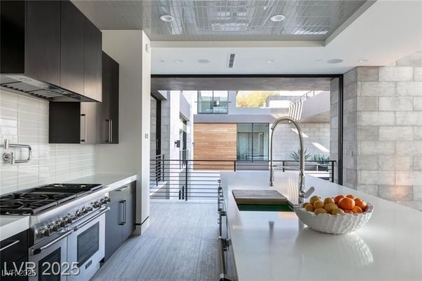 Interior, Kitchen, Recessed Lighting, Stainless Steel Appliances, Stone Walls, Wood Texture Flooring