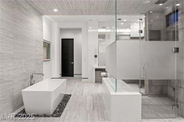 Bathroom, Free Standing Baths, Glass Shower, Interior, Marble Walls, Recessed Lighting
