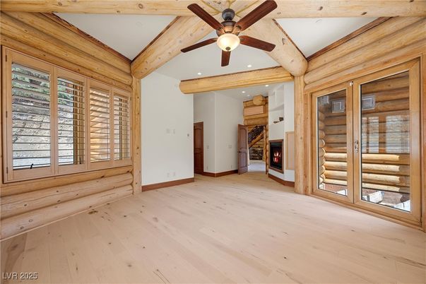Empty room, Fireplace, Interior, Recessed Lighting, Wooden Beams, Wood Texture Flooring, Wooden Walls