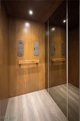 Elevator, Interior, Recessed Lighting, Wood Texture Flooring, Wooden Walls