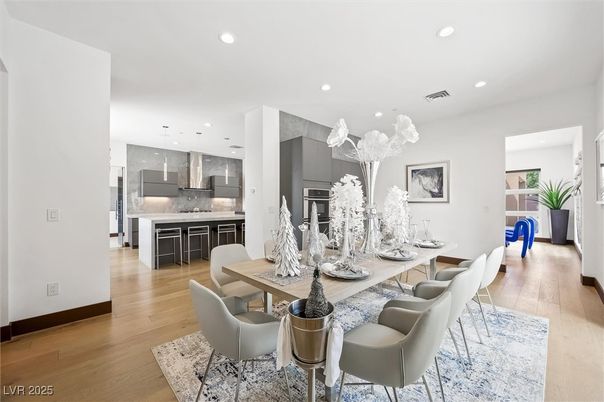 Dining room, Interior, Kitchen, Pendant Lights, Recessed Lighting, Stainless Steel Appliances, Wood Texture Flooring