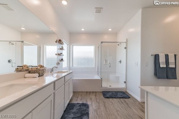 Bathroom, Dual Sink Vanities, Glass Shower, Interior, Recessed Lighting, Wood Texture Flooring
