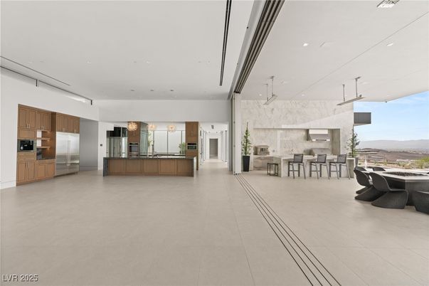 Interior, Kitchen, Marble Walls, Pendant Lights, Recessed Lighting, Stainless Steel Appliances