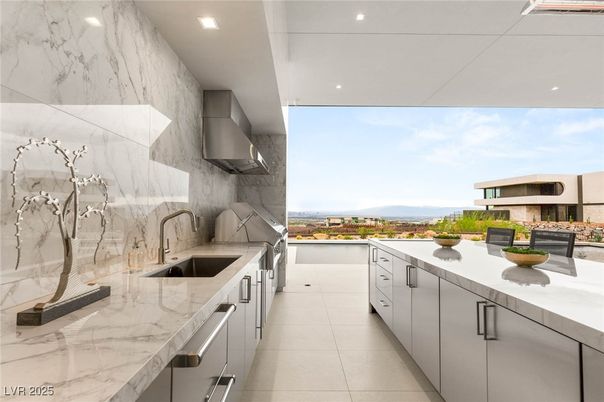 Interior, Kitchen, Marble Walls, Recessed Lighting, Stainless Steel Appliances, Water