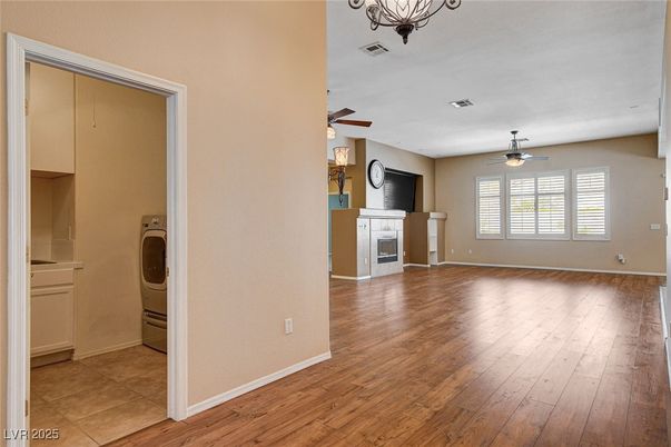 Empty room, Fireplace, Interior, Washer, Wood Texture Flooring
