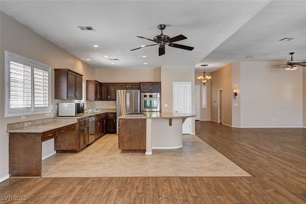 Chandelier, Interior, Kitchen, Recessed Lighting, Stainless Steel Appliances, Wood Texture Flooring