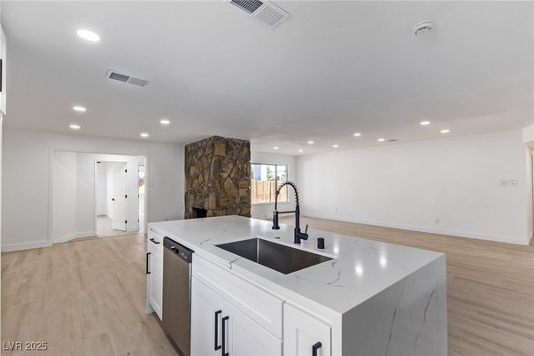 Fireplace, Interior, Kitchen, Recessed Lighting, Stone Walls, Wood Texture Flooring