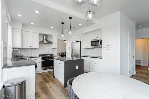 Interior, Kitchen, Pendant Lights, Recessed Lighting, Stainless Steel Appliances, Wood Texture Flooring