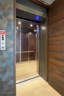 Elevator, Interior, Recessed Lighting, Wood Texture Flooring, Wooden Walls