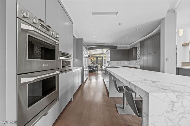 Dining room, Interior, Kitchen, Recessed Lighting, Stainless Steel Appliances, Wood Texture Flooring