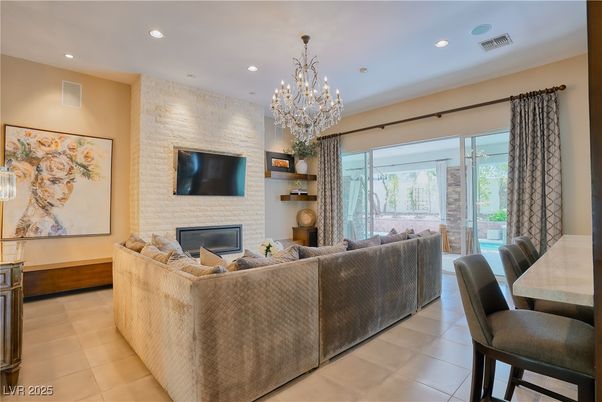 Chandelier, Dining room, Fireplace, Interior, Living room, Recessed Lighting, Stone Walls