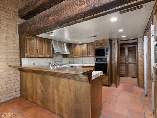 Interior, Kitchen, Recessed Lighting, Stainless Steel Appliances, Stone Walls