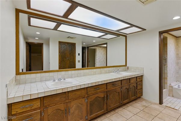 Bathroom, Dual Sink Vanities, Interior, Recessed Lighting, Tile Countertops