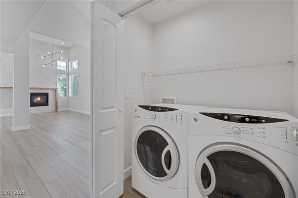 Fireplace, Interior, Utility Closets, Washer, Wood Texture Flooring