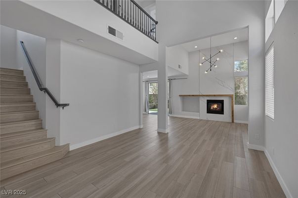 Fireplace, Interior, Pendant Lights, Recessed Lighting, Wood Texture Flooring