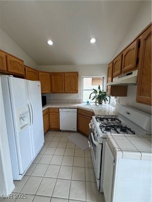 Interior, Kitchen, Recessed Lighting, Tile Countertops