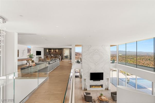 Fireplace, Interior, Living room, Marble Walls, Pendant Lights, Recessed Lighting, Wood Texture Flooring