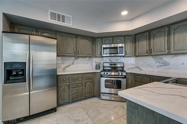Interior, Kitchen, Marble, Marble Walls, Recessed Lighting, Stainless Steel Appliances