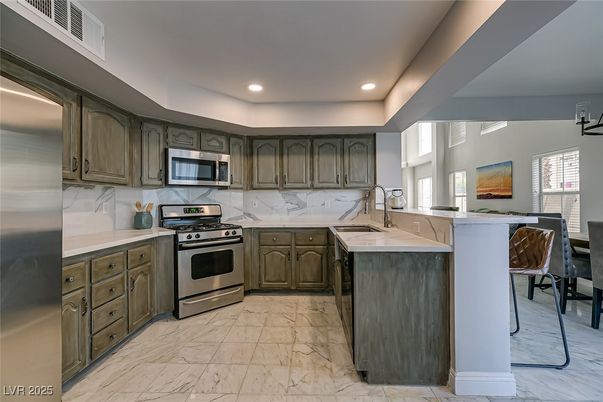 Interior, Kitchen, Marble, Marble Walls, Recessed Lighting, Stainless Steel Appliances
