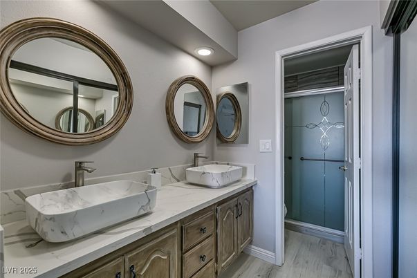 Bathroom, Dual Sink Vanities, Interior, Recessed Lighting, Wood Texture Flooring