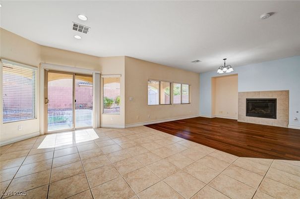 Chandelier, Empty room, Fireplace, Interior, Recessed Lighting, Wood Texture Flooring
