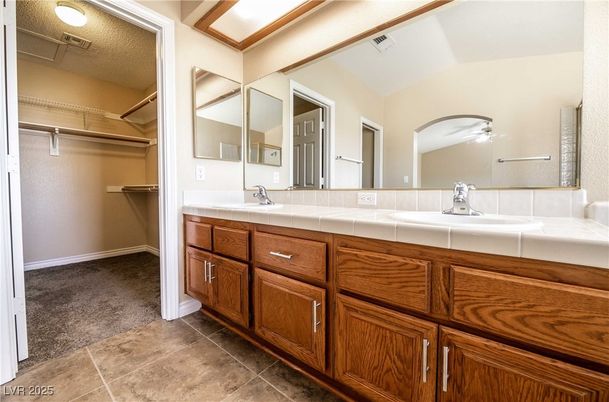 Bathroom, Dual Sink Vanities, Interior, Tile Countertops, Walk-in Closets