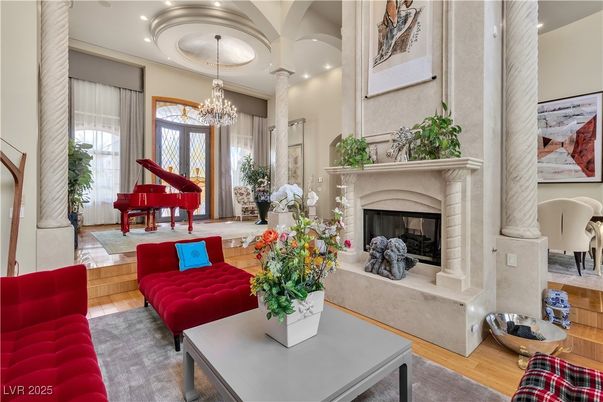 Chandelier, Fireplace, Interior, Living room, Piano, Recessed Lighting, Wood Texture Flooring