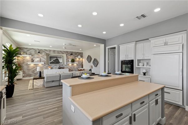 Interior, Kitchen, Living room, Recessed Lighting, Stainless Steel Appliances, Stone Walls, Wood Texture Flooring