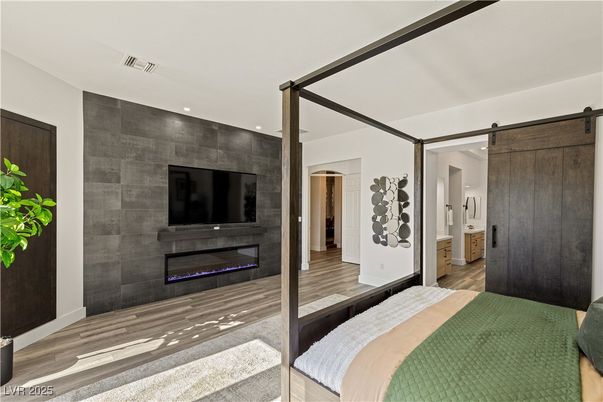 Bedroom, Fireplace, Interior, Recessed Lighting, Wood Texture Flooring