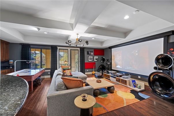 Chandelier, Interior, Living room, Projection Screen, Recessed Lighting, Theatre Room, Wood Texture Flooring