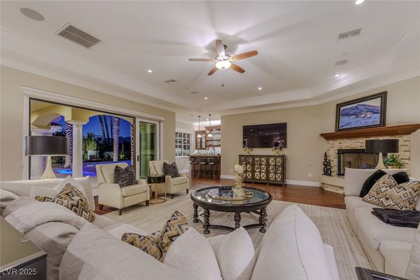 Dining room, Fireplace, Interior, Living room, Pendant Lights, Recessed Lighting, Wood Texture Flooring