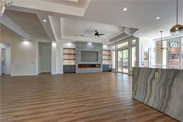 Empty room, Fireplace, Interior, Pendant Lights, Recessed Lighting, Wood Texture Flooring