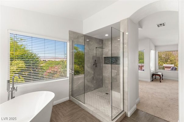 Bathroom, Free Standing Baths, Glass Shower, Interior, Recessed Lighting, Wood Texture Flooring