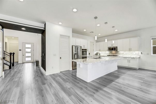 Interior, Kitchen, Pendant Lights, Recessed Lighting, Stainless Steel Appliances, Wood Texture Flooring