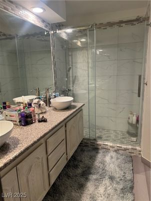 Bathroom, Dual Sink Vanities, Glass Shower, Interior, Marble Walls, Recessed Lighting