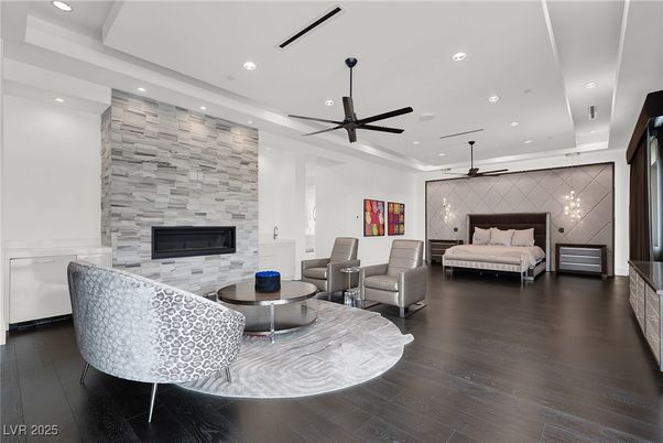 Bedroom, Fireplace, Interior, Living room, Pendant Lights, Recessed Lighting, Stone Walls, Wood Texture Flooring
