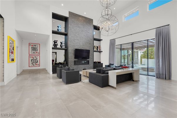 Chandelier, Fireplace, Interior, Living room, Pendant Lights, Recessed Lighting, Stone Walls