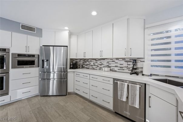 Interior, Kitchen, Recessed Lighting, Stainless Steel Appliances, Wood Texture Flooring