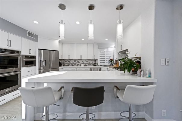 Interior, Kitchen, Pendant Lights, Recessed Lighting, Stainless Steel Appliances, Wood Texture Flooring