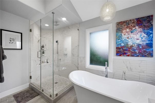 Bathroom, Free Standing Baths, Glass Shower, Interior, Marble Walls, Pendant Lights, Recessed Lighting