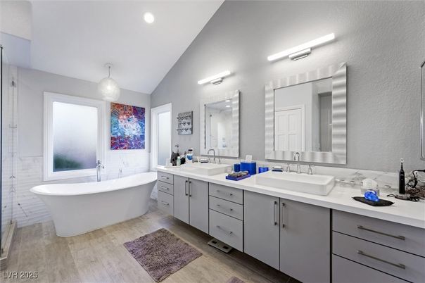 Bathroom, Dual Sink Vanities, Free Standing Baths, Interior, Recessed Lighting, Wood Texture Flooring