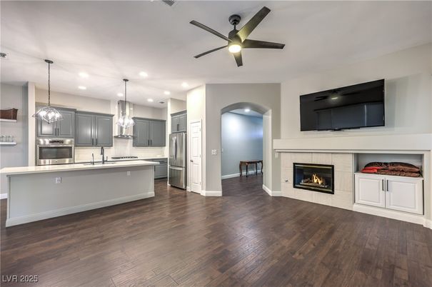 Fireplace, Interior, Kitchen, Pendant Lights, Recessed Lighting, Stainless Steel Appliances, Wood Texture Flooring