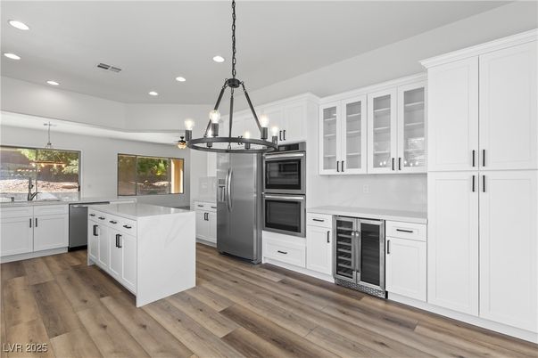 Chandelier, Interior, Kitchen, Pendant Lights, Recessed Lighting, Stainless Steel Appliances, Wood Texture Flooring