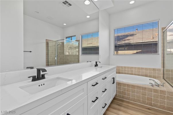 Bathroom, Dual Sink Vanities, Glass Shower, Interior, Recessed Lighting, Wood Texture Flooring