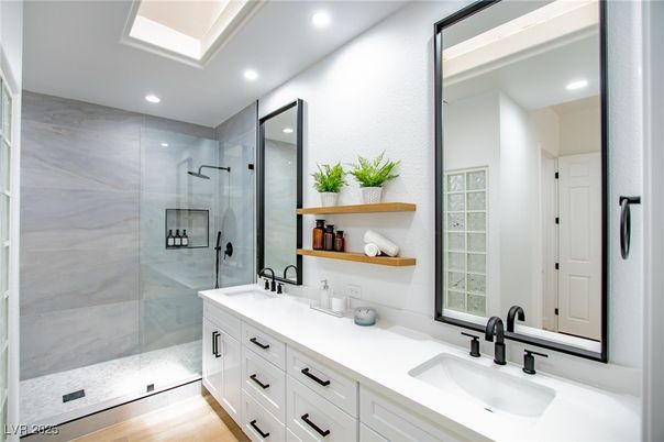 Bathroom, Dual Sink Vanities, Glass Shower, Interior, Recessed Lighting, Wood Texture Flooring